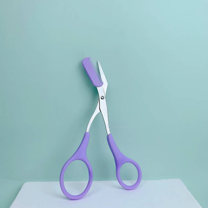 Pink eyebrow trimming scissors with built-in comb - stainless steel, precise grooming tool, creating perfect eyebrows